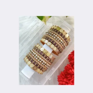 Home A set of custom matching silk thread bangles held against a designer fabric to show color accuracy