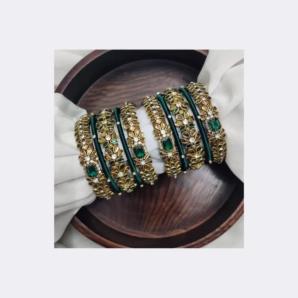 vibrant-green-silk-thread-bangles-for-mehendi-ceremony Dark green silk thread bangles for mehendi with colorful pom-poms and mirror embellishments